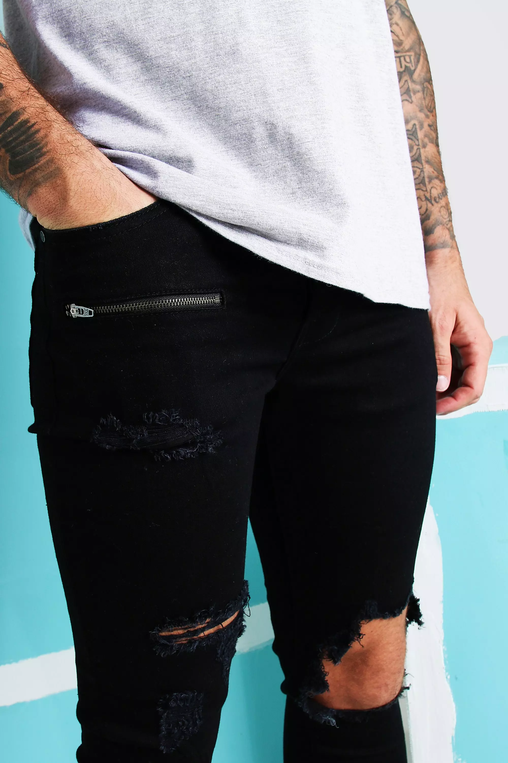 Black knee hot sale blowout jeans